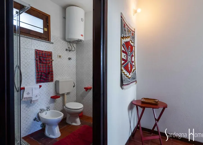 Sardegna Homes Casa Rosa בית נופש באדזי